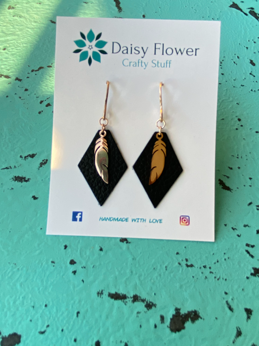 Leather Black w/ rose gold feathers earrings