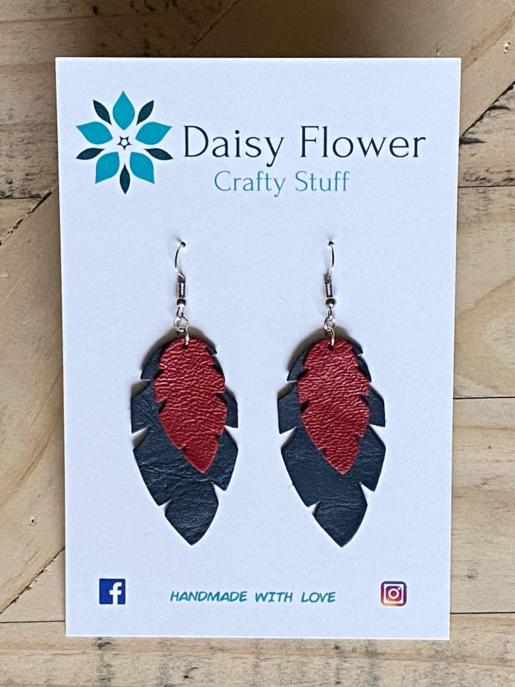 Leather navy blue and red feather earrings